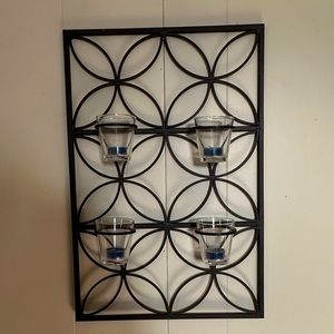 Iron and glass wall art.